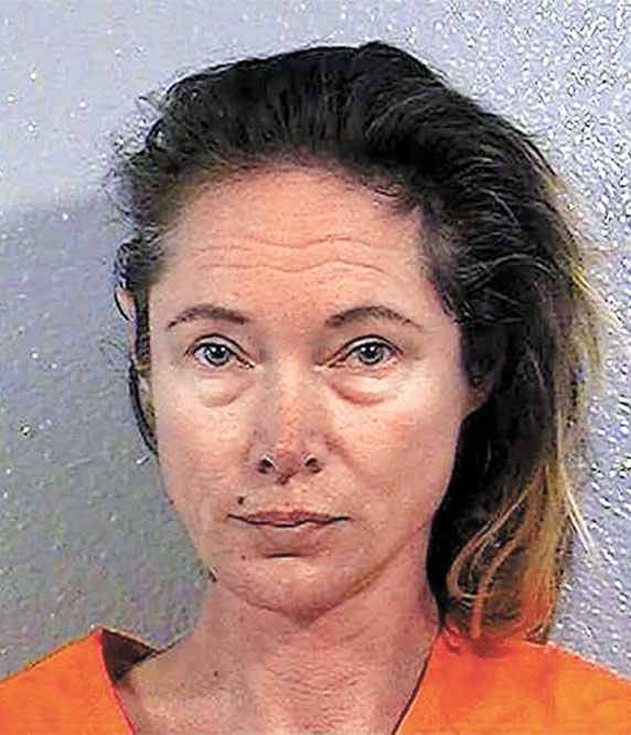 雷姆利承認僱兇殺害前夫後拍攝的入獄照。加州懲教署