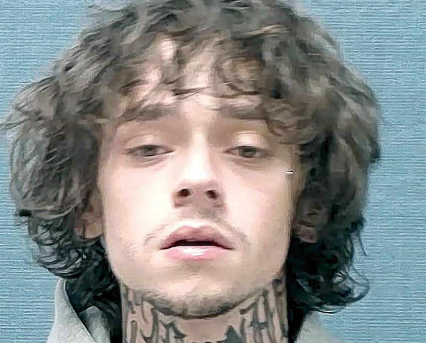 竊嫌謝恩紐曼的入獄照，攝於2025年12月18日。坎頓警察局