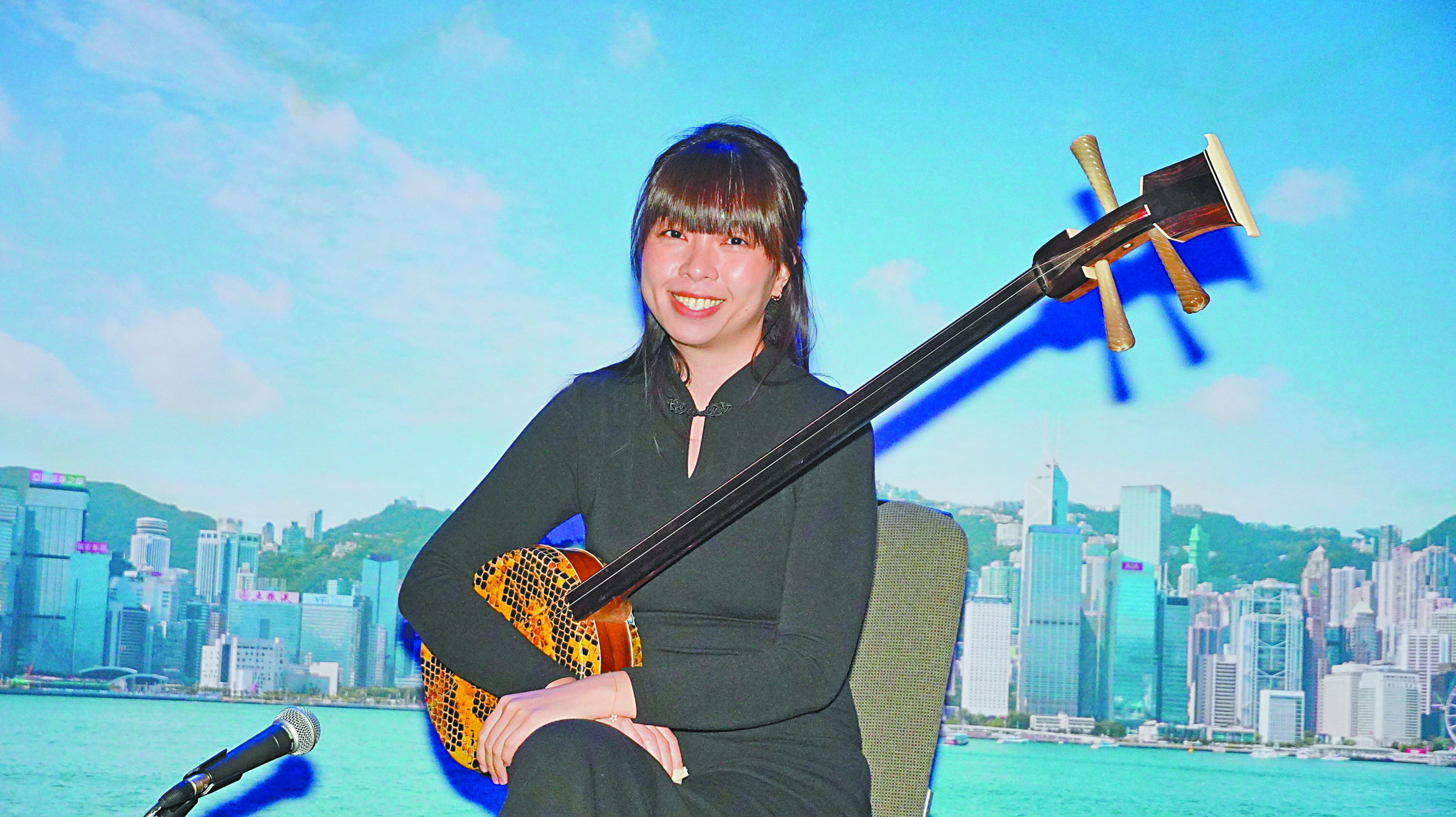 三弦演奏家及民族音樂學者陳曦彤獻藝。記者黃偉江攝