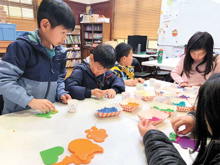 亞洲婦女服務中心向孩子免費提供託兒及免費午餐。受訪者提供